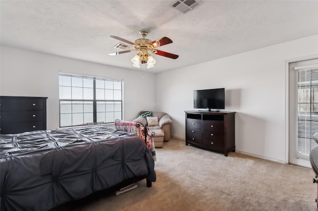 221 Kokomo Run, Point Blank, TX 77364 - carpeted bedroom featuring visible vents, ceiling fan, and baseboards