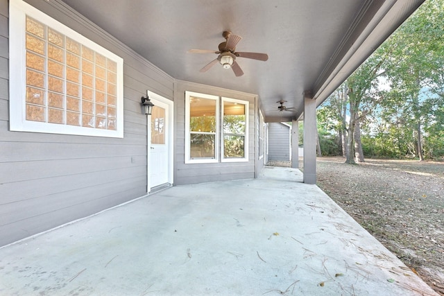 view of patio featuring ceiling fan