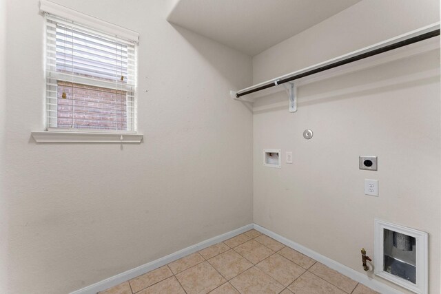 laundry room with laundry area, washer hookup, baseboards, and hookup for a gas dryer