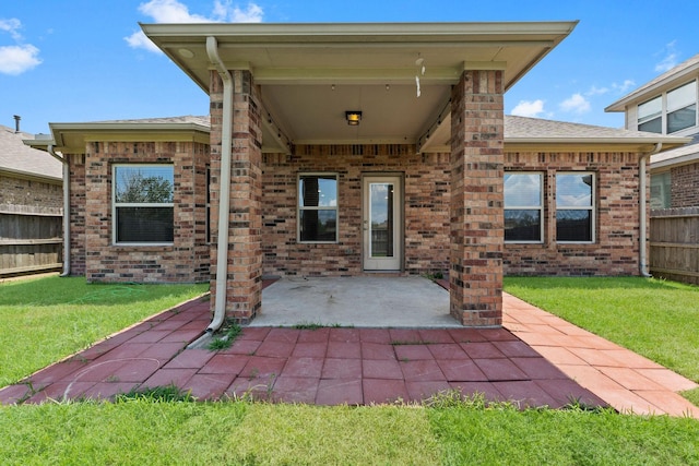 view of patio / terrace featuring fence