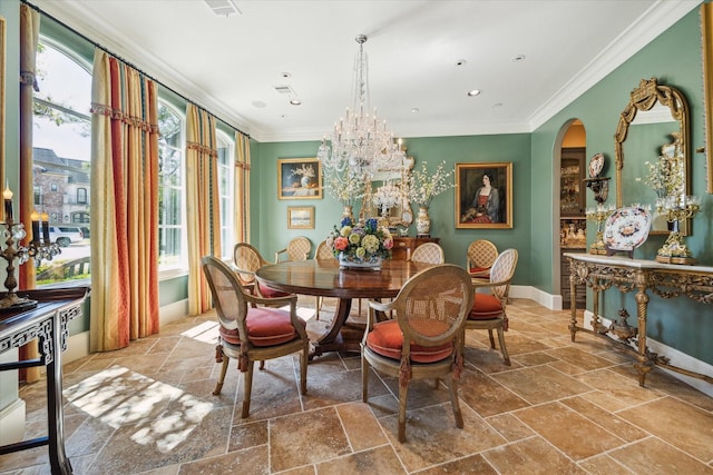 3410 Banbury Pl, Houston, TX 77027 - dining space featuring crown molding, stone tile floors, baseboards, and a wealth of natural light
