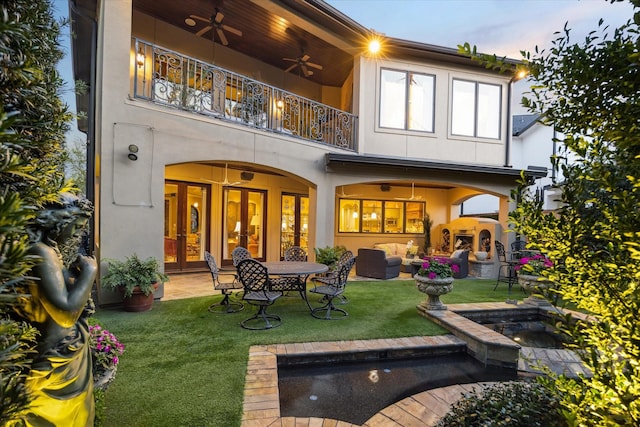 3410 Banbury Pl, Houston, TX 77027 - back of property featuring a ceiling fan, french doors, a yard, and a balcony