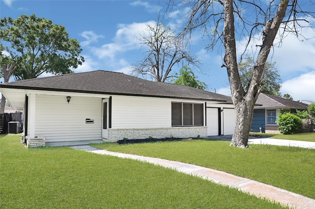 5538 Berry Creek Dr, Houston, TX 77017 - view of front of property featuring a front yard, a garage, aphalt driveway, cooling unit, and roof with shingles