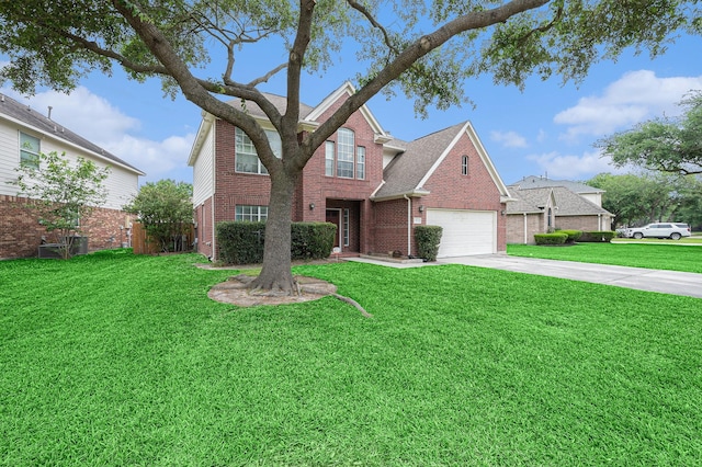 13134 Durbridge Trail Dr, Houston, TX 77065 - traditional home with a garage, brick siding, driveway, and a front lawn
