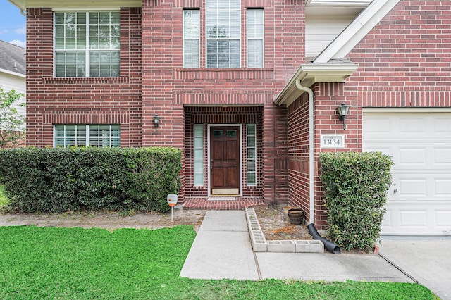 13134 Durbridge Trail Dr, Houston, TX 77065 - property entrance featuring brick siding and an attached garage