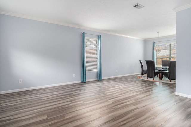 13134 Durbridge Trail Dr, Houston, TX 77065 - interior space featuring a notable chandelier, baseboards, crown molding, and wood finished floors
