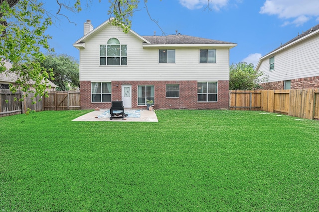 13134 Durbridge Trail Dr, Houston, TX 77065 - back of property featuring a patio area, brick siding, and a fenced backyard