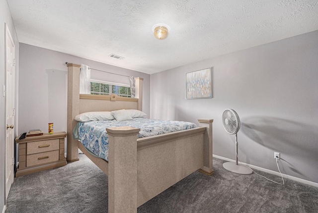 13134 Durbridge Trail Dr, Houston, TX 77065 - carpeted bedroom with a textured ceiling, baseboards, and visible vents
