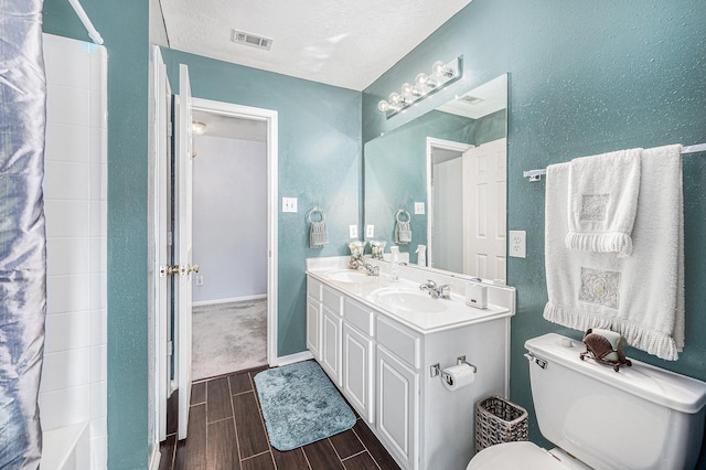 13134 Durbridge Trail Dr, Houston, TX 77065 - bathroom featuring visible vents, toilet, wood finished floors, a sink, and a shower with shower curtain