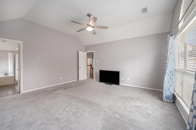 13134 Durbridge Trail Dr, Houston, TX 77065 - unfurnished bedroom featuring carpet floors, baseboards, a ceiling fan, and lofted ceiling