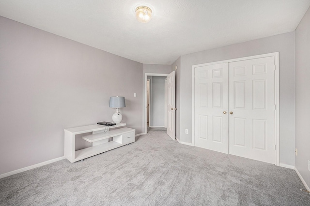 13134 Durbridge Trail Dr, Houston, TX 77065 - unfurnished bedroom with a closet, carpet flooring, and baseboards