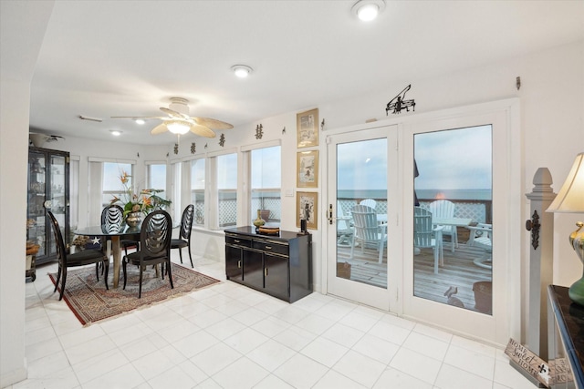 dining room with ceiling fan and visible vents