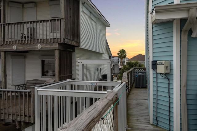 deck at dusk with central AC