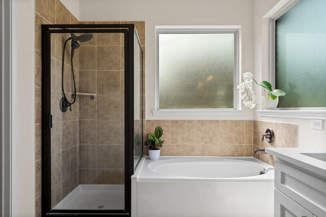 120 Brooke Addison Ct, Montgomery, TX 77316 - bathroom with a shower stall, plenty of natural light, and a garden tub