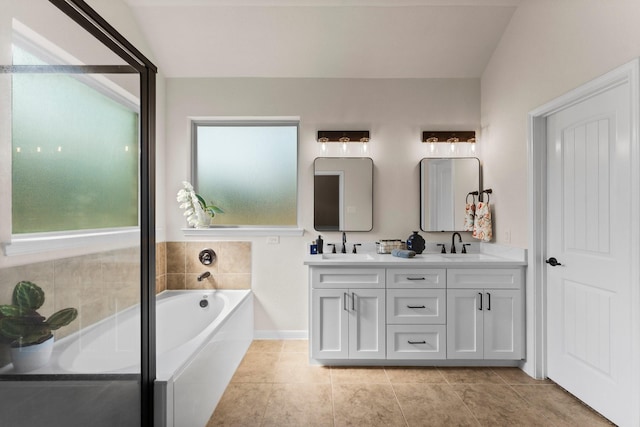 120 Brooke Addison Ct, Montgomery, TX 77316 - full bath featuring a bath, double vanity, a sink, and tile patterned floors
