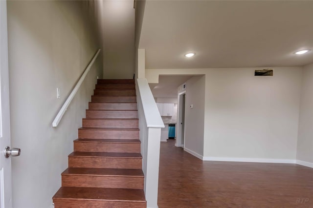 12046 Beechnut St, Houston, TX 77072 - stairs with recessed lighting, baseboards, and wood finished floors