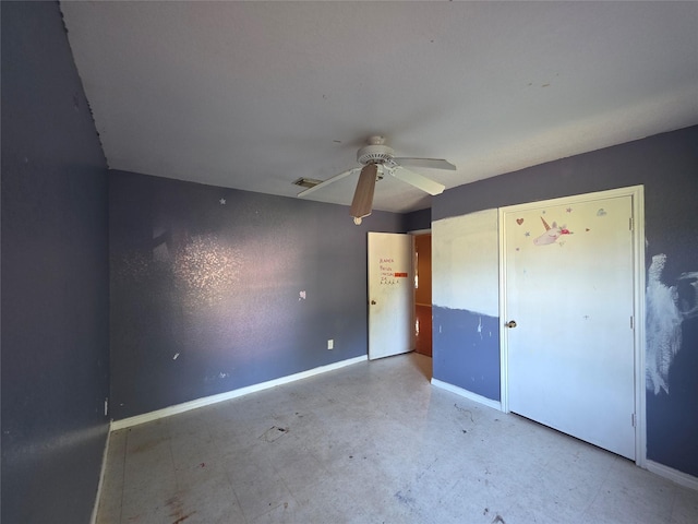 unfurnished bedroom with visible vents, baseboards, and ceiling fan