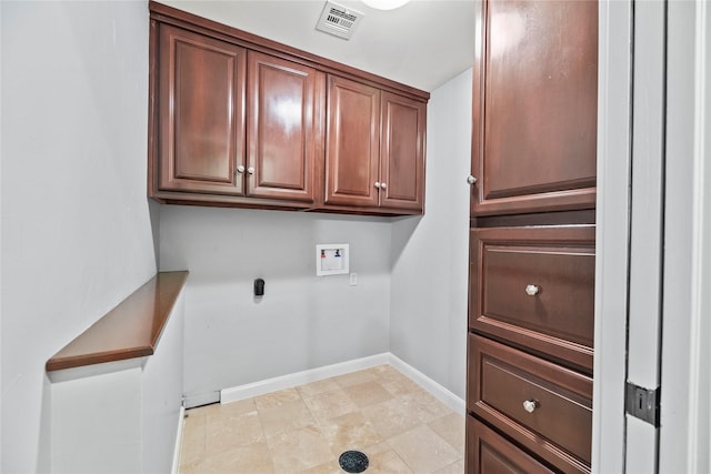 laundry room featuring cabinet space, washer hookup, electric dryer hookup, baseboards, and visible vents