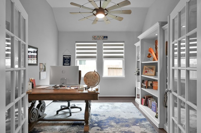 home office featuring vaulted ceiling, french doors, and wood finished floors