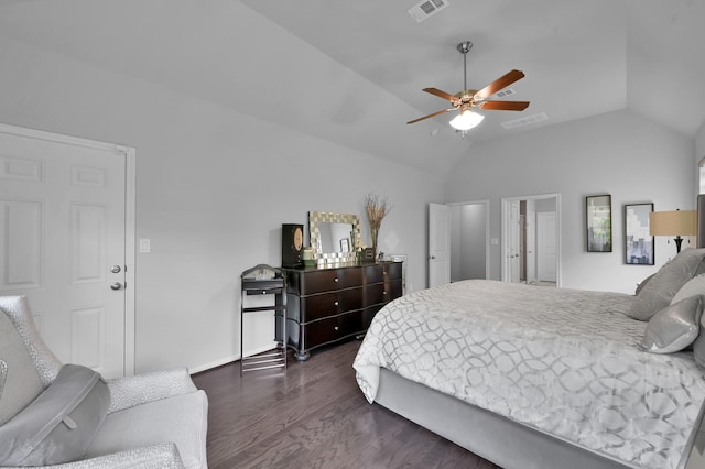 bedroom with dark wood-type flooring, visible vents, ceiling fan, and vaulted ceiling
