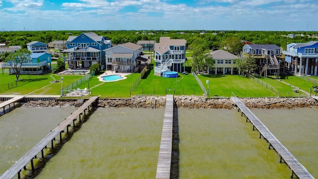 aerial view featuring a water view and a residential view