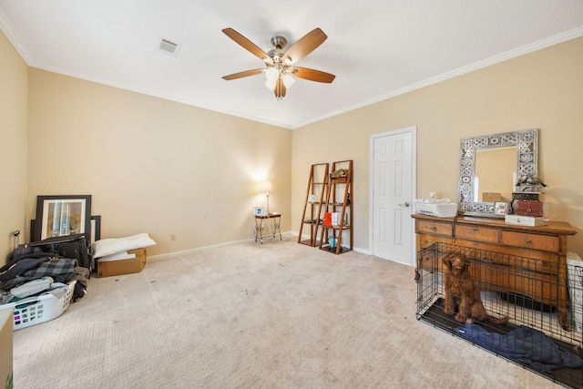 living area featuring ceiling fan, ornamental molding, visible vents, carpet floors, and baseboards