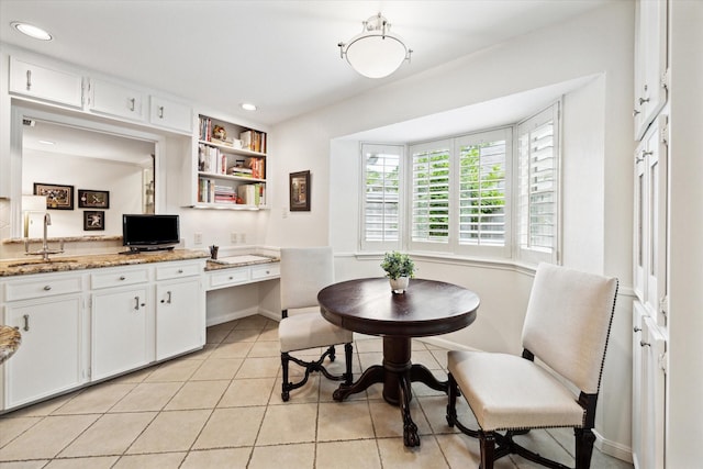 dining room featuring recessed lighting, light tile patterned floors, and baseboards