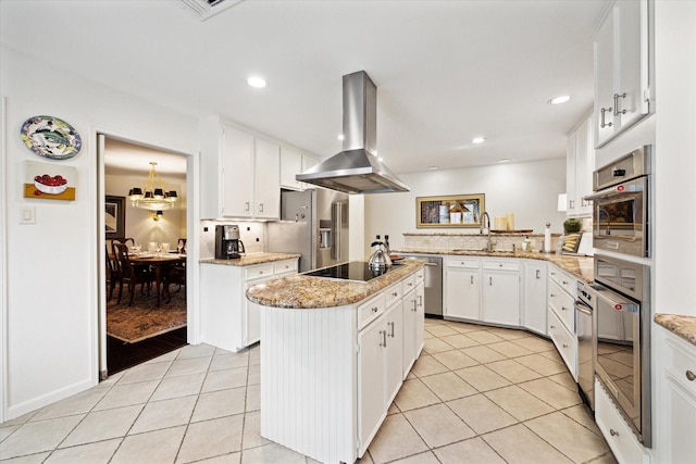 kitchen featuring island exhaust hood, light tile patterned floors, a center island with sink, stainless steel appliances, and a sink