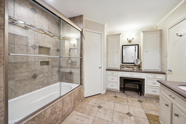 bathroom featuring crown molding, vanity, and tiled shower / bath combo