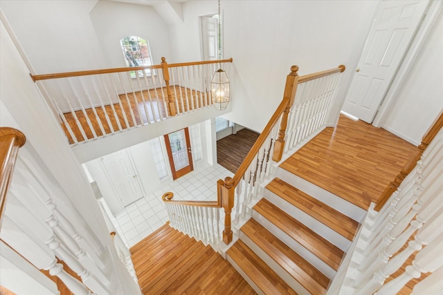 stairway with wood finished floors