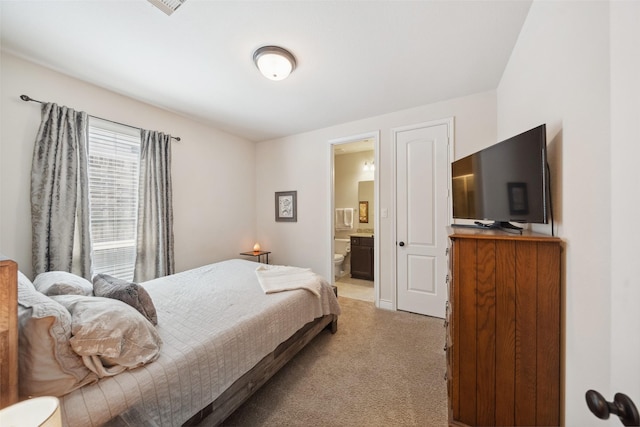 122 Verismo Ct, Montgomery, TX 77316 - bedroom featuring light carpet and ensuite bathroom