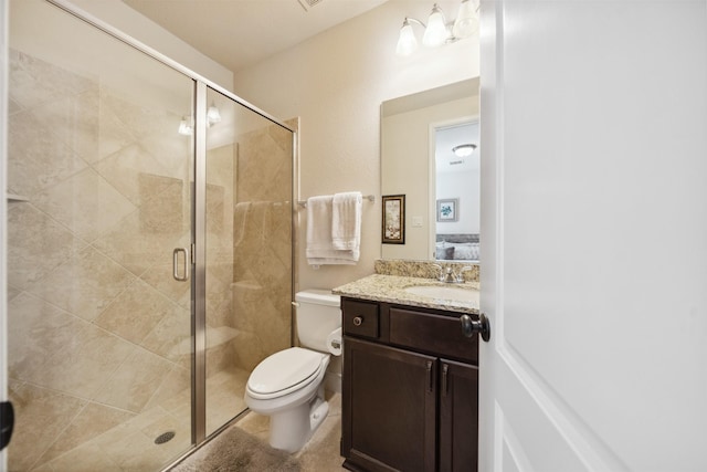 122 Verismo Ct, Montgomery, TX 77316 - ensuite bathroom with toilet, a shower stall, connected bathroom, vanity, and tile patterned floors