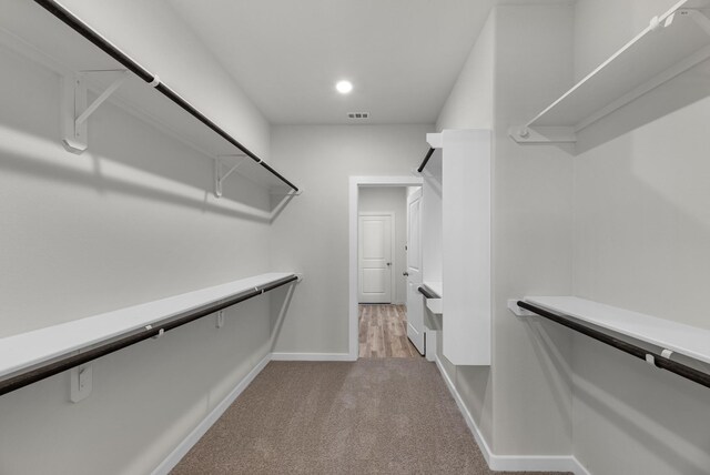 21624 Alberta Forest Cir, Magnolia, TX 77355 - spacious closet with visible vents and light carpet