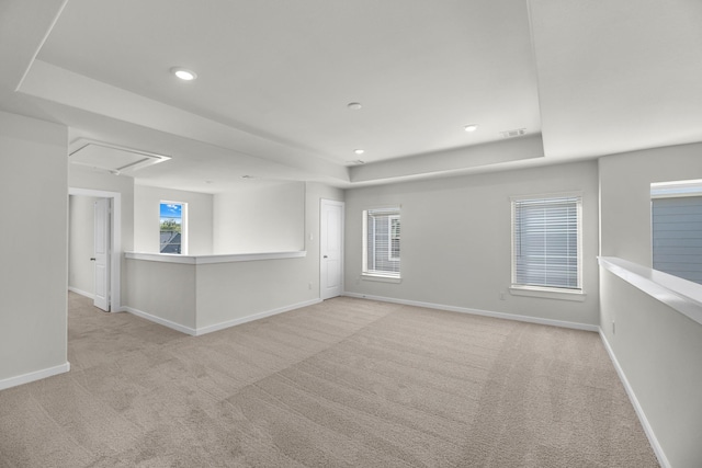 21624 Alberta Forest Cir, Magnolia, TX 77355 - carpeted spare room featuring a raised ceiling, attic access, baseboards, and visible vents