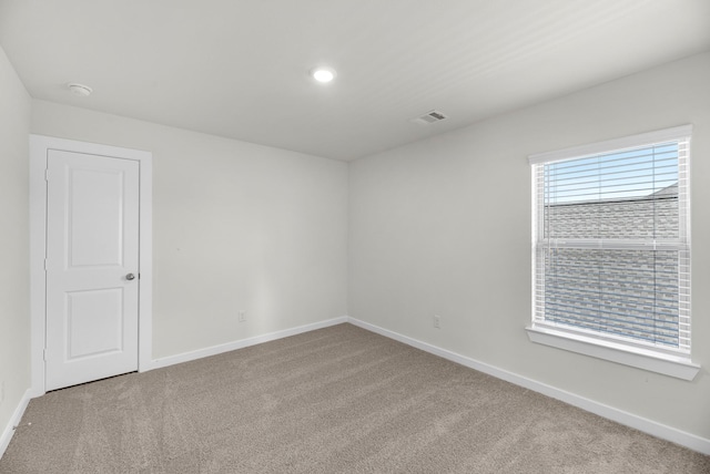 21624 Alberta Forest Cir, Magnolia, TX 77355 - carpeted spare room featuring visible vents and baseboards