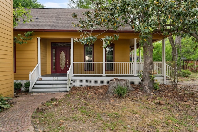 property entrance with a porch