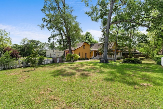view of yard with fence