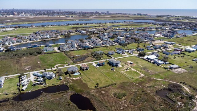 2027 103rd St, Galveston, TX 77554 - aerial view featuring a water view and a residential view