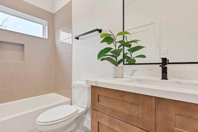 full bath featuring toilet and vanity