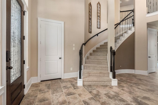 1715 Laremont Bend Dr, Spring, TX 77386 - foyer entrance featuring stairs and baseboards