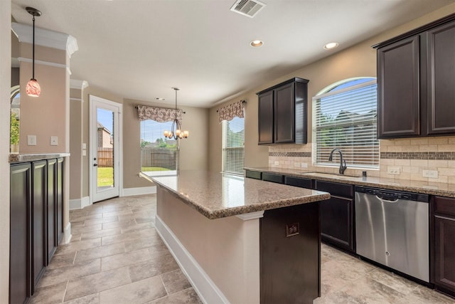 1715 Laremont Bend Dr, Spring, TX 77386 - kitchen with stainless steel dishwasher, a sink, a center island, tasteful backsplash, and light stone counters