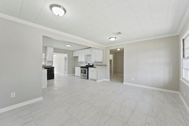 unfurnished living room with visible vents, baseboards, and crown molding