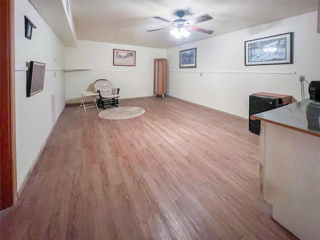 3203 Bayou Dr, La Porte, TX 77571 - sitting room featuring light wood finished floors and ceiling fan