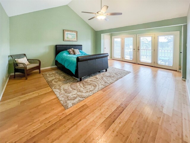 3203 Bayou Dr, La Porte, TX 77571 - bedroom featuring access to outside, wood finished floors, lofted ceiling, a ceiling fan, and baseboards