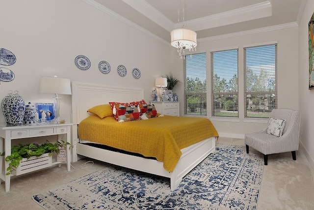 247 Arabian Dr, The Woodlands, TX 77382 - carpeted bedroom featuring baseboards, ornamental molding, a chandelier, and a tray ceiling