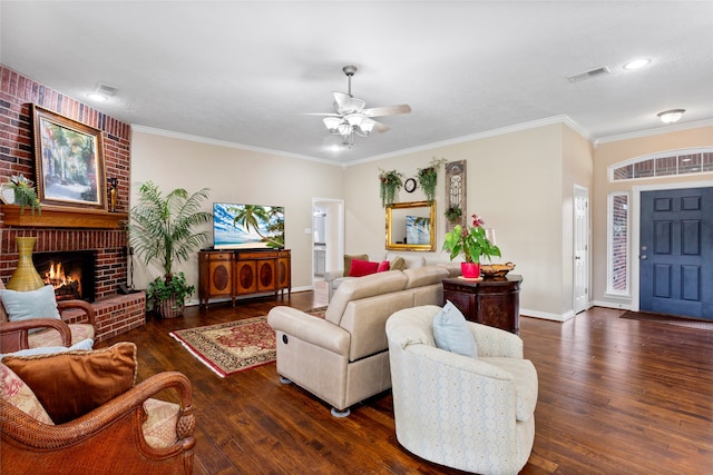 living area with baseboards, ceiling fan, visible vents, and hardwood / wood-style flooring