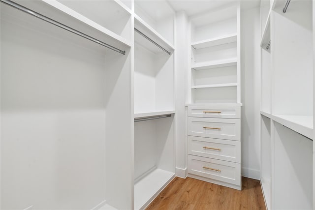 4323 Rogers St, Houston, TX 77022 - walk in closet with light wood-style flooring