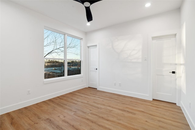 4323 Rogers St, Houston, TX 77022 - spare room featuring recessed lighting, light wood-style flooring, baseboards, and ceiling fan