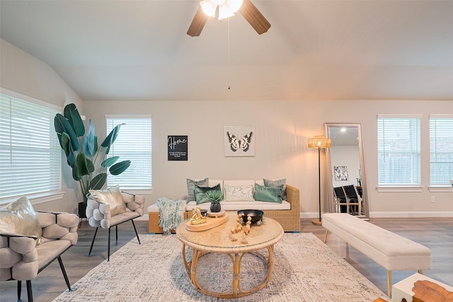 24603 Dover Bend Way, Richmond, TX 77406 - living area with healthy amount of natural light, vaulted ceiling, a ceiling fan, and wood finished floors