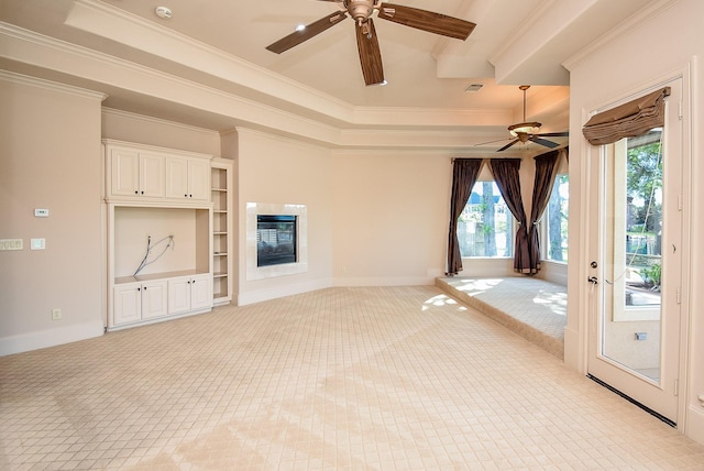 2 Royal Hampton Ct, Sugar Land, TX 77479 - unfurnished living room with a tray ceiling, baseboards, light colored carpet, a ceiling fan, and ornamental molding